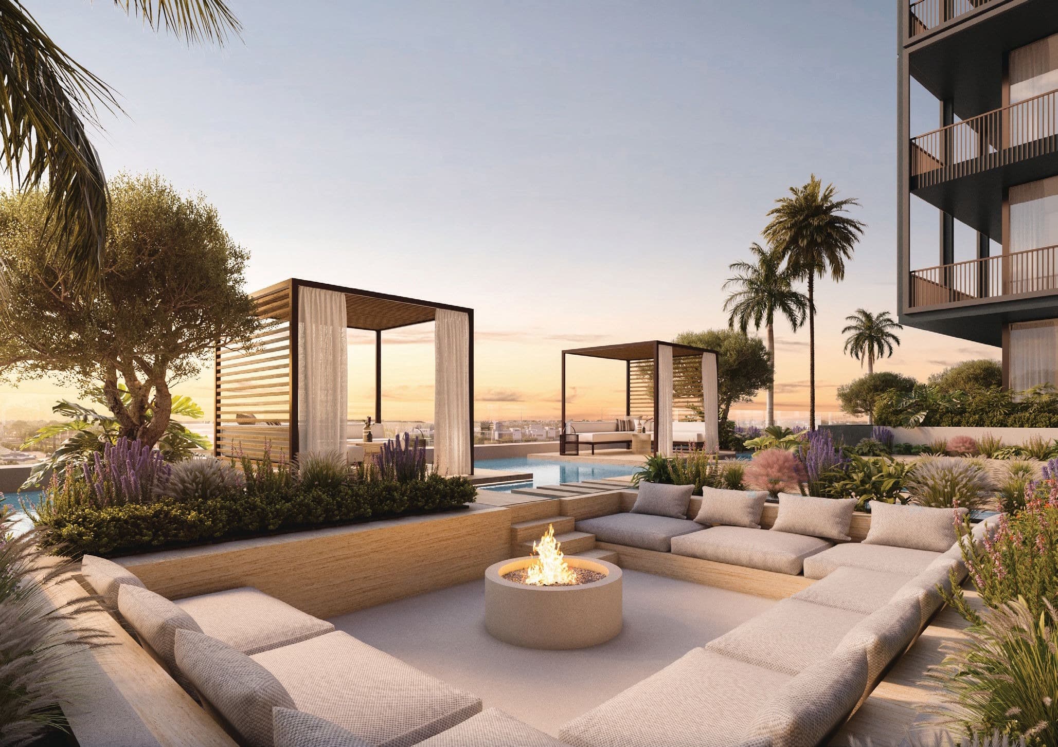 Private rooftop cabanas at sunset